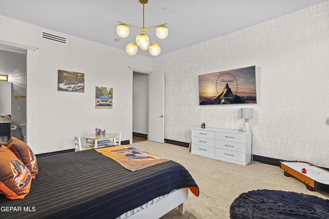 5905 Ojo De Agua Dr, El Paso, TX 79912 - bedroom featuring carpet flooring, baseboards, a chandelier, and wallpapered walls