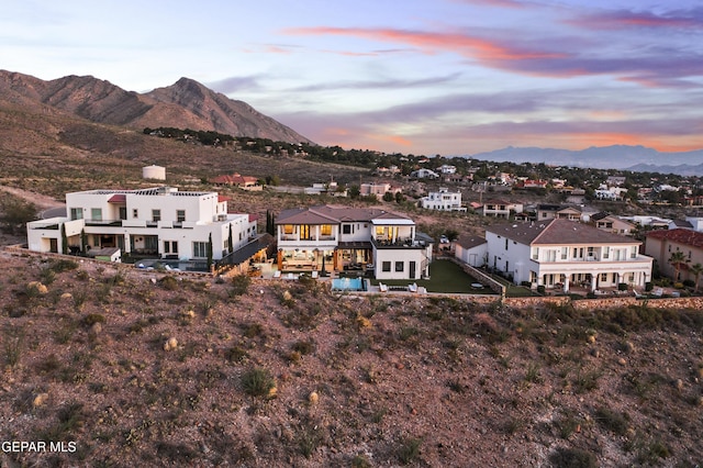 5905 Ojo De Agua Dr, El Paso, TX 79912 - aerial view of property and surrounding area featuring mountains and nearby suburban area