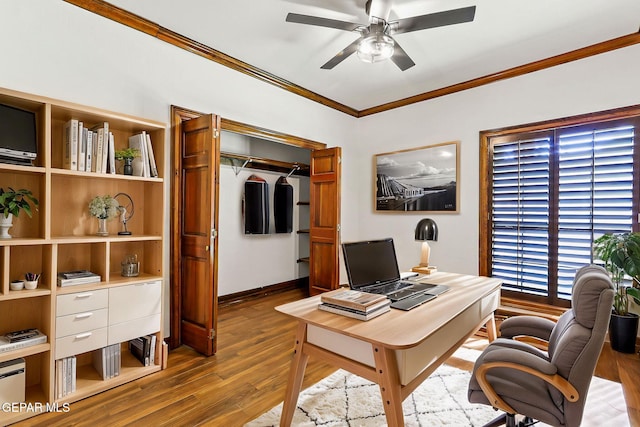 office area featuring ornamental molding, ceiling fan, and wood finished floors