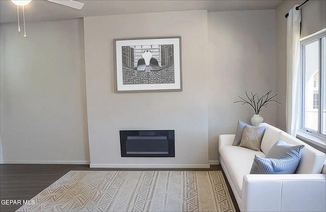 3825 Trowbridge Dr, El Paso, TX 79903 - living room featuring plenty of natural light, wood finished floors, and baseboards