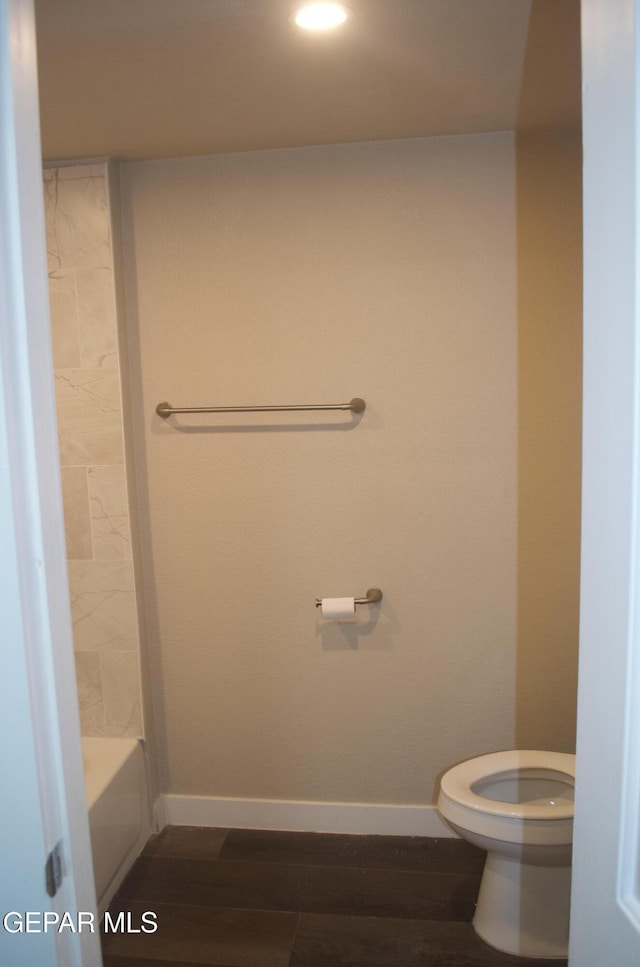 3825 Trowbridge Dr, El Paso, TX 79903 - bathroom featuring toilet, baseboards, wood finished floors, and recessed lighting