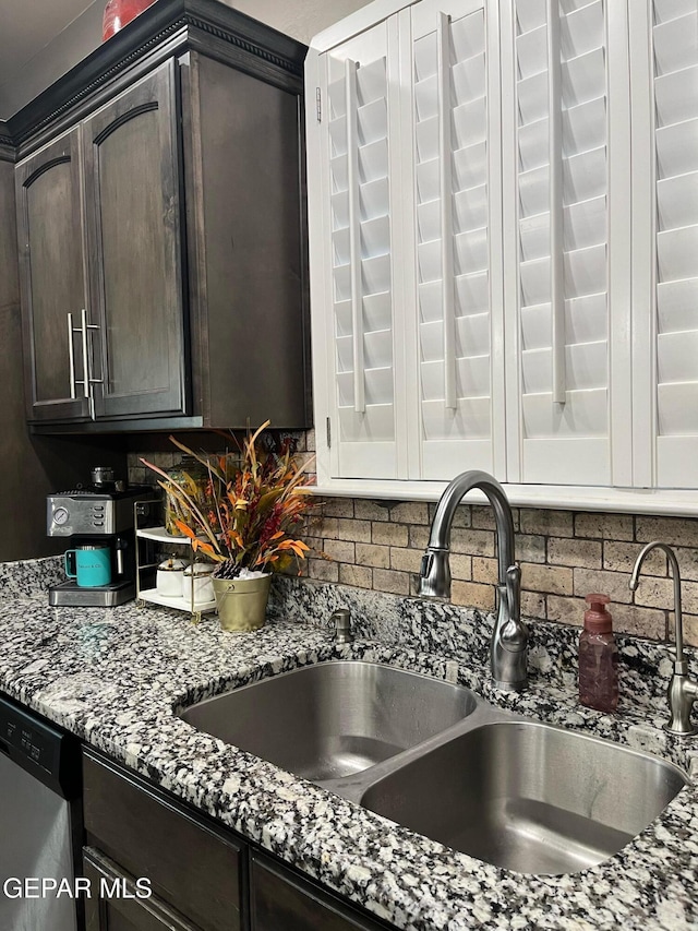 14233 Richard Wiles Ave, El Paso, TX 79938 - kitchen with a sink, dark brown cabinetry, stone counters, and tasteful backsplash