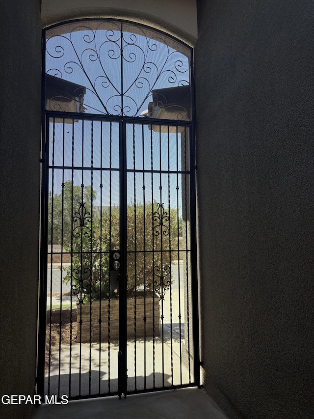 14233 Richard Wiles Ave, El Paso, TX 79938 - detailed view of a gate and stucco siding
