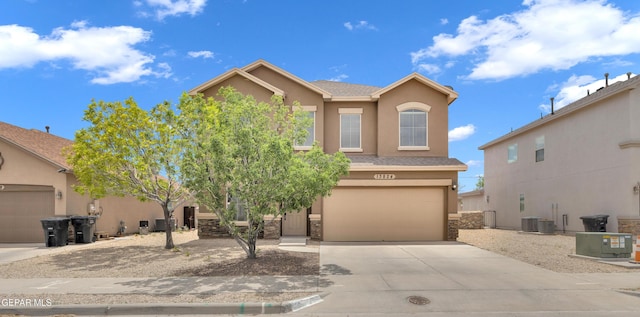 13824 Hollywood Dr, Horizon City, TX 79928 - traditional-style house with stucco siding, driveway, an attached garage, and stone siding