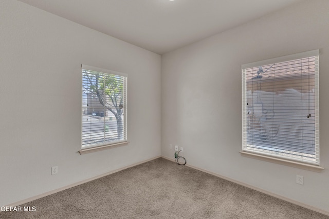 13824 Hollywood Dr, Horizon City, TX 79928 - carpeted spare room with baseboards