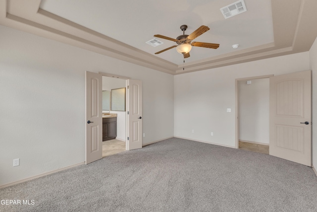 13824 Hollywood Dr, Horizon City, TX 79928 - empty room with a raised ceiling, a ceiling fan, light carpet, and baseboards