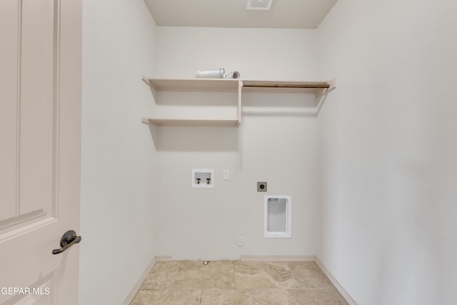 13824 Hollywood Dr, Horizon City, TX 79928 - laundry room featuring hookup for a gas dryer, hookup for a washing machine, hookup for an electric dryer, and baseboards
