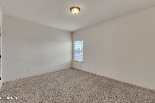 13824 Hollywood Dr, Horizon City, TX 79928 - empty room featuring carpet floors and baseboards