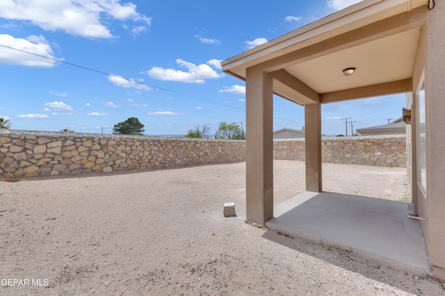 13824 Hollywood Dr, Horizon City, TX 79928 - view of patio featuring a fenced backyard