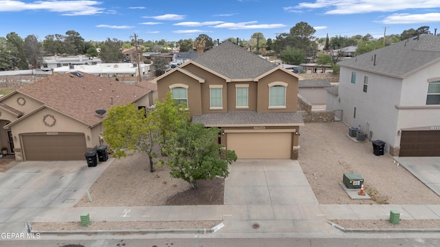 13824 Hollywood Dr, Horizon City, TX 79928 - traditional home with driveway, stucco siding, and cooling unit