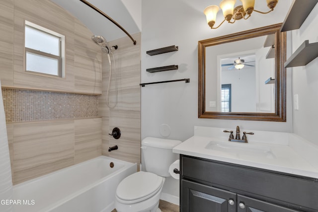 full bathroom with washtub / shower combination, vanity, toilet, and healthy amount of natural light
