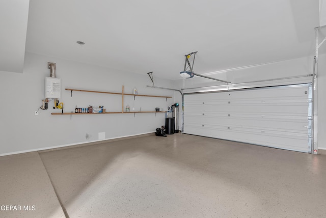 garage featuring a garage door opener and water heater