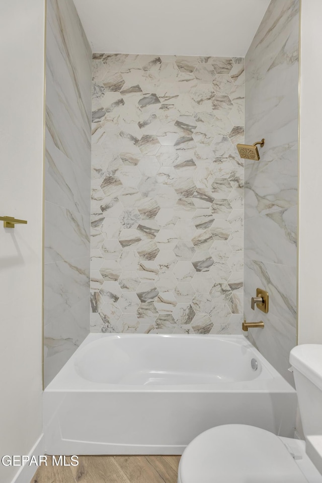 429 Lesa Ln, El Paso, TX 79915 - full bath with toilet, shower / washtub combination, and wood finished floors