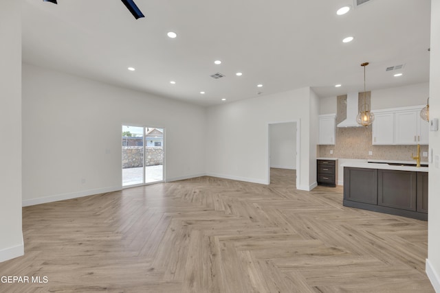 429 Lesa Ln, El Paso, TX 79915 - unfurnished living room with baseboards and recessed lighting
