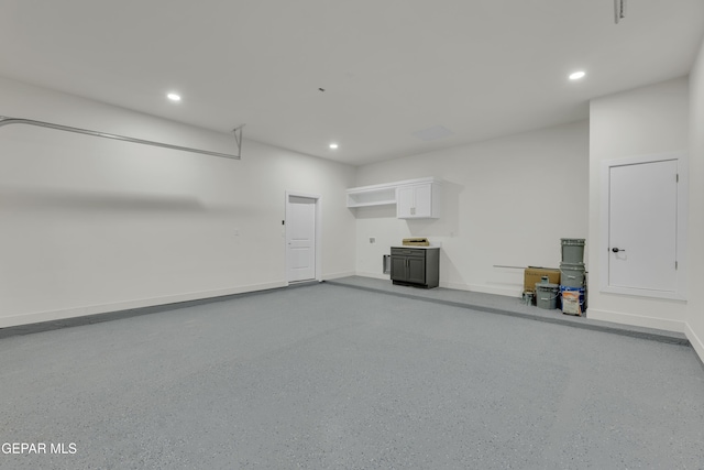 429 Lesa Ln, El Paso, TX 79915 - garage featuring recessed lighting and baseboards