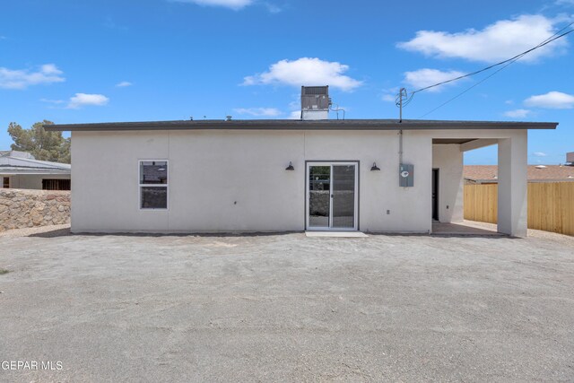 429 Lesa Ln, El Paso, TX 79915 - rear view of property featuring a patio, stucco siding, and central air condition unit