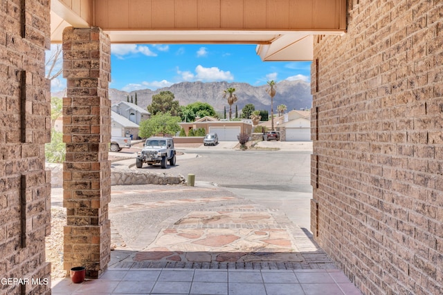 view of patio / terrace with a mountain view