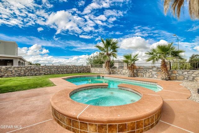 1403 Franklin Dell St, El Paso, TX 79912 - view of pool with a fenced backyard and an in-ground hot tub