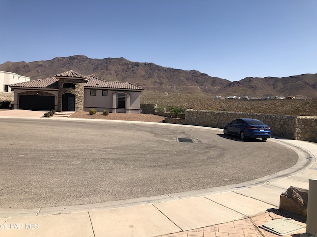 1403 Franklin Dell St, El Paso, TX 79912 - view of asphalt street featuring a mountain view, curbs, and sidewalks