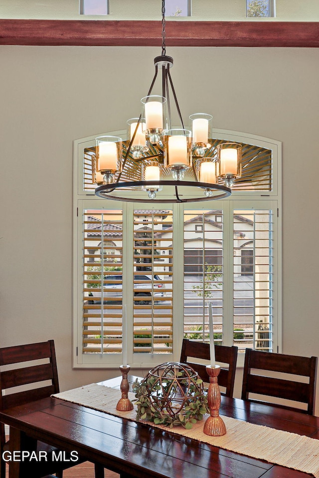 dining area featuring a chandelier