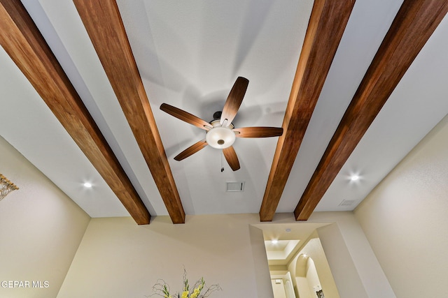 detailed view of beam ceiling, ceiling fan, and recessed lighting