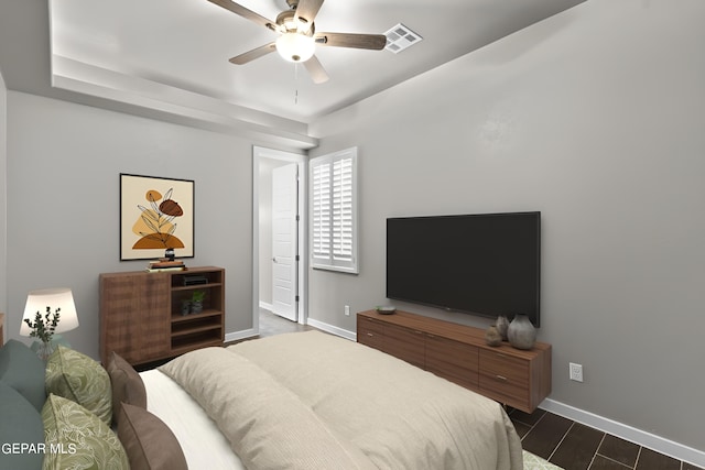 12627 Naes Way, El Paso, TX 79928 - bedroom featuring baseboards, a ceiling fan, and dark wood-style flooring