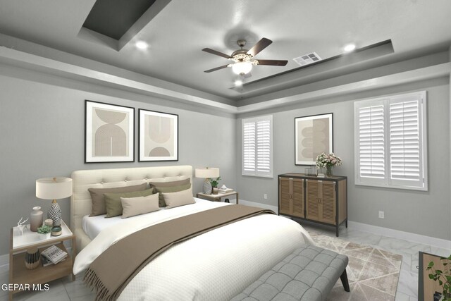 12627 Naes Way, El Paso, TX 79928 - bedroom featuring baseboards, a raised ceiling, and a ceiling fan