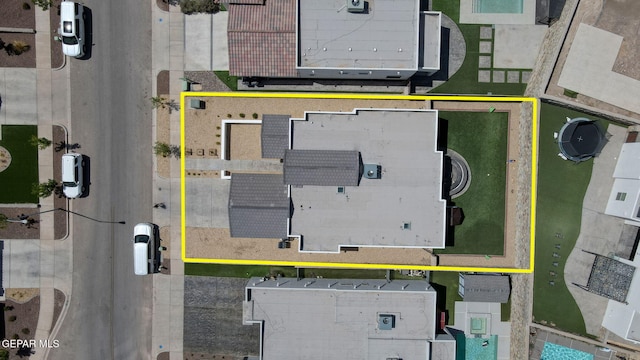 aerial view of property and surrounding area with property boundaries highlighted