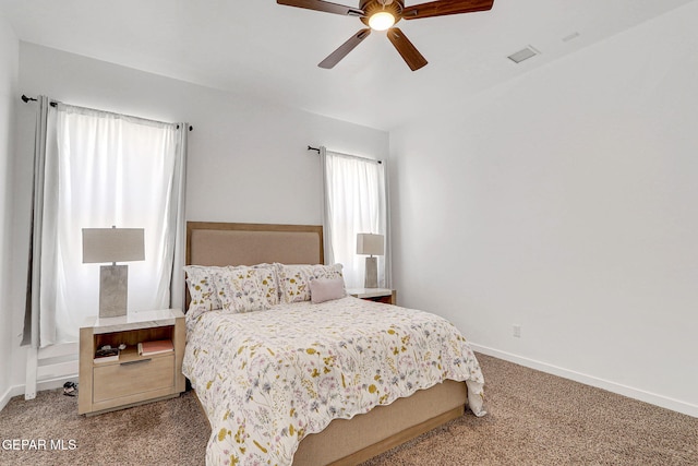 bedroom featuring carpet, baseboards, and ceiling fan
