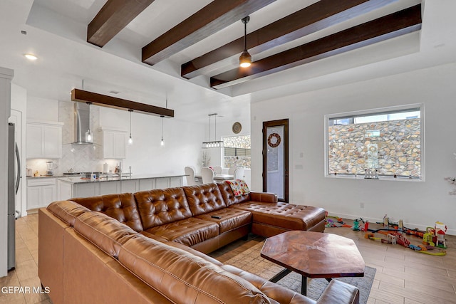living room featuring beam ceiling