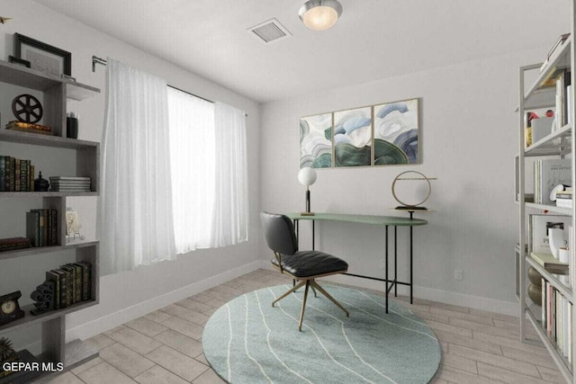office area featuring baseboards