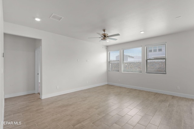 7461 Big Mountain Ct, El Paso, TX 79911 - unfurnished room with a ceiling fan, light wood-style flooring, baseboards, and recessed lighting
