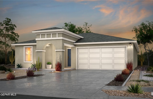 14429 Sabio, Horizon City, TX 79928 - prairie-style home with driveway, an attached garage, stucco siding, and a shingled roof