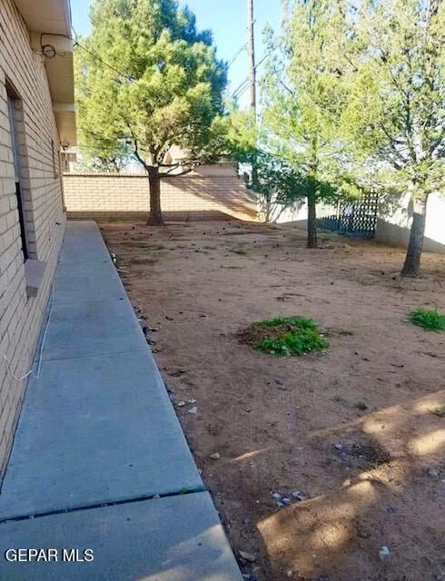 view of yard featuring fence