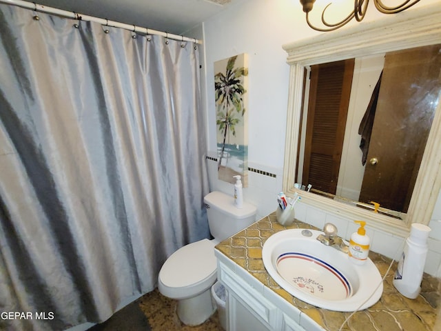3433 Dialrock Ln, El Paso, TX 79935 - bathroom featuring toilet and vanity