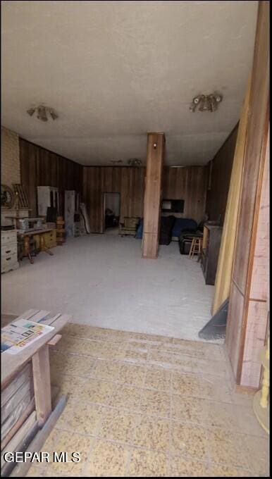 3433 Dialrock Ln, El Paso, TX 79935 - finished basement with wood walls