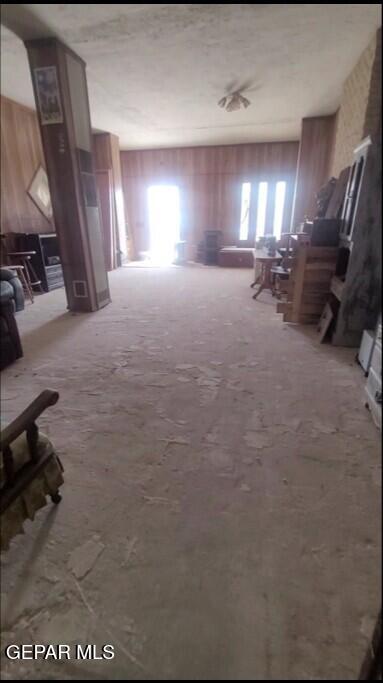 3433 Dialrock Ln, El Paso, TX 79935 - miscellaneous room with carpet flooring