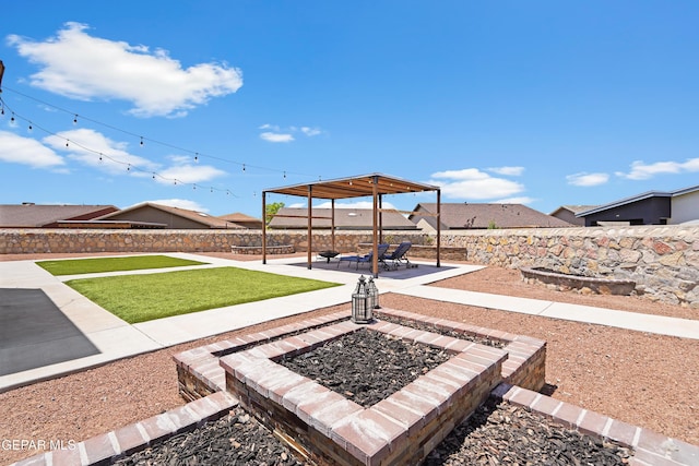 view of patio with an outdoor fire pit