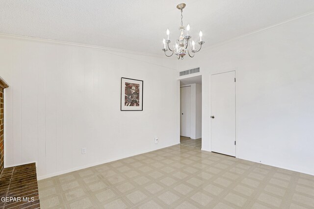unfurnished room with a chandelier, crown molding, and light floors