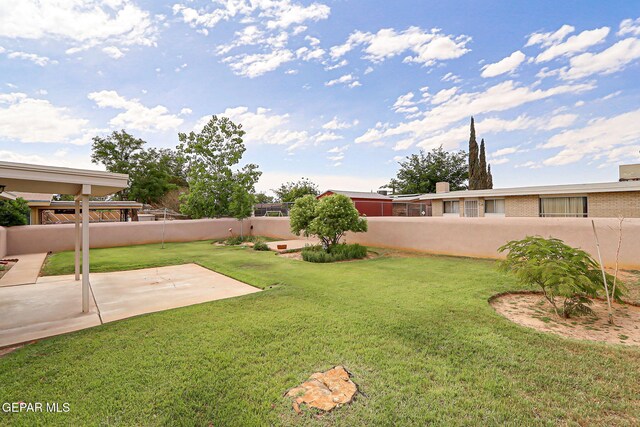view of yard with a patio area
