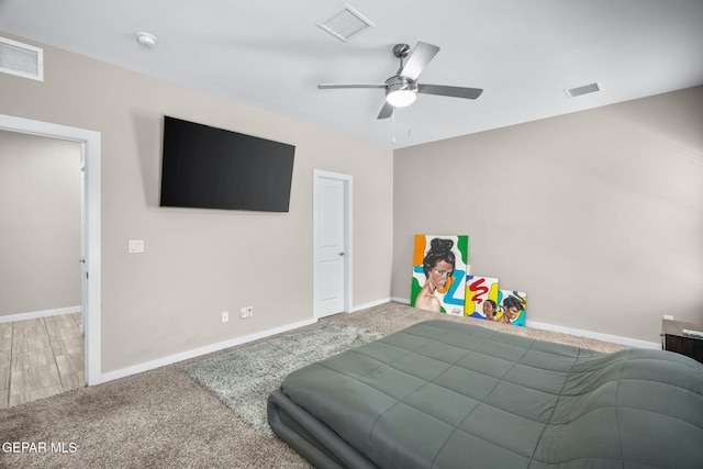 bedroom with carpet flooring, baseboards, and ceiling fan