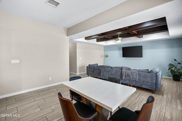 dining area with baseboards, coffered ceiling, a ceiling fan, beamed ceiling, and wood tiled floors