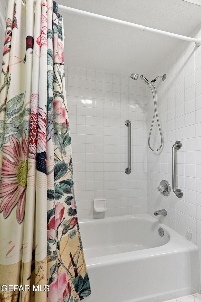 7008 Desert Canyon Dr, El Paso, TX 79912 - bathroom featuring shower / bathtub combination with curtain