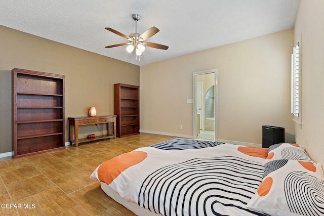 7008 Desert Canyon Dr, El Paso, TX 79912 - bedroom with baseboards and connected bathroom