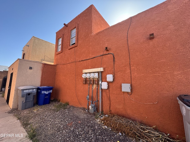 10620 Cuatro Vistas Dr Unit A, El Paso, TX 79935 - view of side of home featuring stucco siding