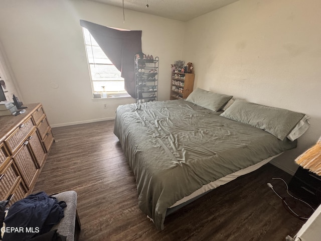 10620 Cuatro Vistas Dr Unit A, El Paso, TX 79935 - bedroom with wood finished floors and baseboards