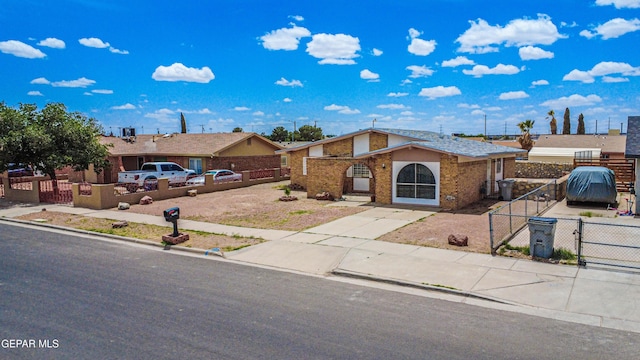 8520 Paddlefoot Ln, El Paso, TX 79907 - single story home with a gate and brick siding