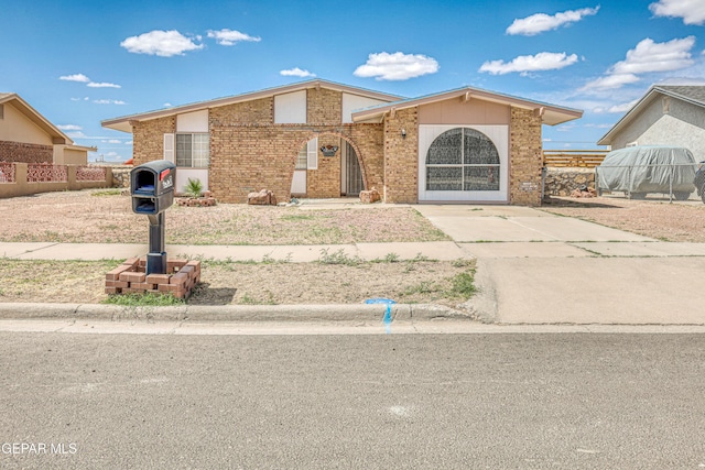 8520 Paddlefoot Ln, El Paso, TX 79907 - view of front of house featuring fence and brick siding
