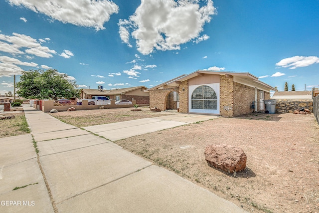 8520 Paddlefoot Ln, El Paso, TX 79907 - view of front of property featuring brick siding and fence