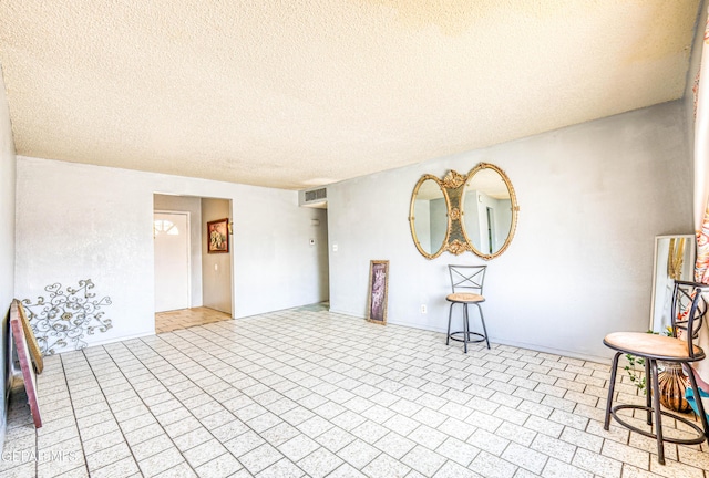 8520 Paddlefoot Ln, El Paso, TX 79907 - unfurnished room with a textured ceiling